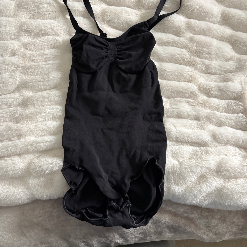 Elegant Black Women's Bodysuit from skims